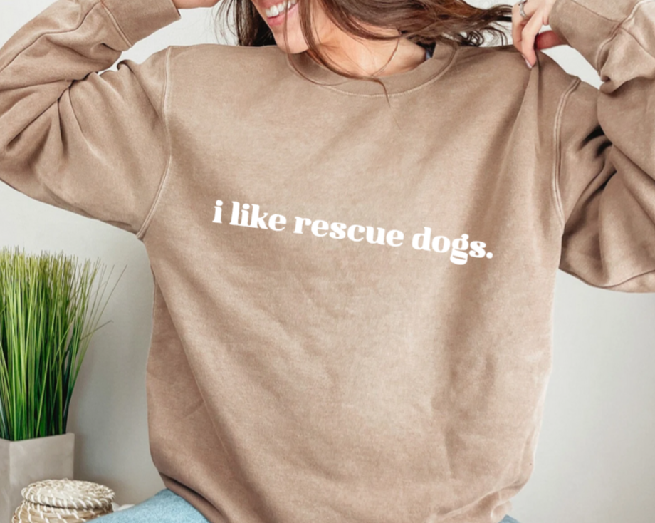 i like rescue dogs. | Brown Unisex Crewneck